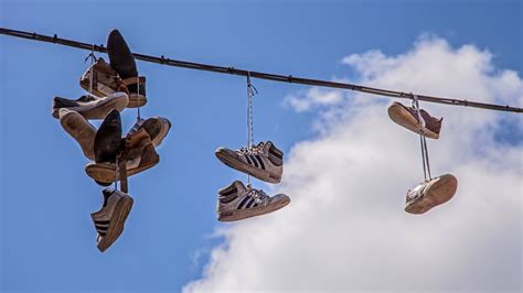 shoes hanging on wire meaning.